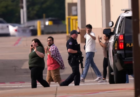 Survivors of the Texas Mall Shooting, leaving the scene (found on https://www.independent.co.uk/news/world/americas/crime/allen-premium-outlets-shooting-twitter-b2334768.html)